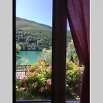 Casa A Schiera Fronte Con Giardino Hébergement de vacances Barcis
